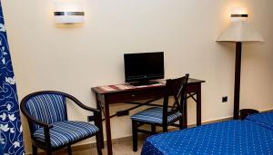 Телевизор и/или развлекательный центр в Hotel Rural El Jardin