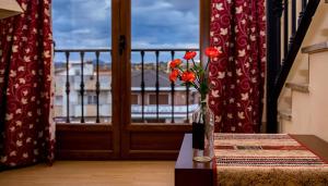 Кровать или кровати в номере Hotel Rural El Jardin +37 фотографий