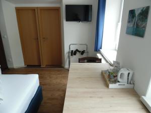 TV a/nebo společenská místnost v ubytování Ferienhaus Kolbnitz