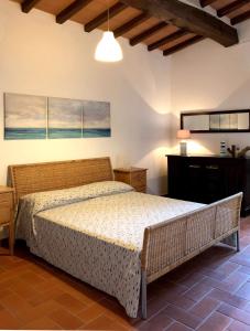 En eller flere senge i et værelse på Elba Villa Colle - Nel verde ma vicina al mare