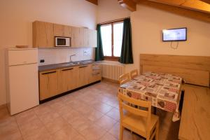 Kuchyň nebo kuchyňský kout v ubytování Residence Meridiana