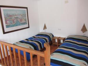 A bed or beds in a room at Sierra y Mar