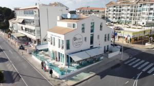 an overhead view of a building on a city street at Ocean Lounge in Altea