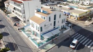 an overhead view of a building on a city street at Ocean Lounge in Altea
