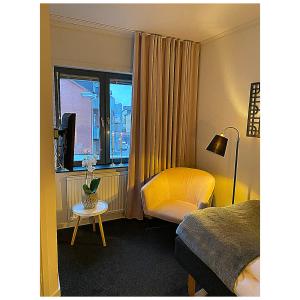 Postel nebo postele na pokoji v ubytování Hotell Värend