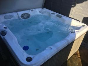 Spa and/or other wellness facilities at Sunset Retreat Lodge with Hot Tub