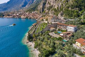 an aerial view of a town on the shore of a lake at Hotel Al Rio Se in Limone sul Garda