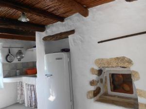 Virtuvė arba virtuvėlė apgyvendinimo įstaigoje Το σπίτι του Παππού.
