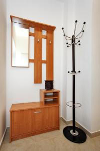 a dressing room with a mirror and a dresser at Apartment Village Nin in Nin