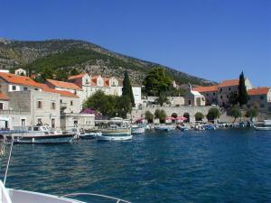 a group of boats are docked in a harbor at Villa Jasmin in Bol