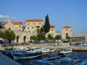 a group of boats are docked in a harbor at Villa Jasmin in Bol