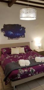 Postel nebo postele na pokoji v ubytování B&B Pierilu'
