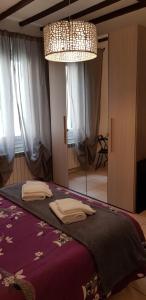 Postel nebo postele na pokoji v ubytování B&B Pierilu'
