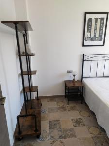 A bed or beds in a room at Dafne's Beach
