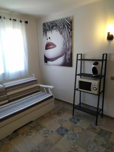 A bed or beds in a room at Dafne's Beach