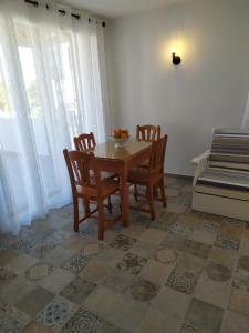 A seating area at Dafne's Beach