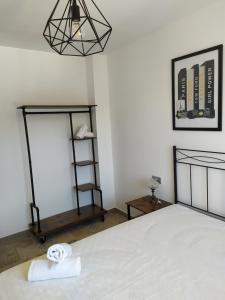 A bed or beds in a room at Dafne's Beach