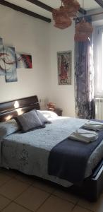 Postel nebo postele na pokoji v ubytování B&B Pierilu'
