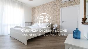 A bed or beds in a room at Italianway - Baracca 7 B