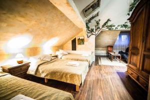 Posteľ alebo postele v izbe v ubytovaní Dwór Boratyn + 37 fotografií