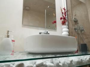Koupelna v ubytování Casa Orrù + 5 fotografií