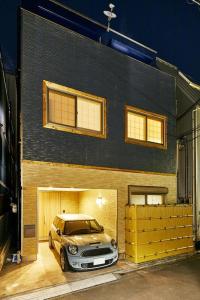 a car parked in the garage of a house at 634 Condo Yotsuya - Vacation STAY 14799v in Tokyo