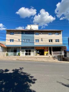 a building on the side of a street at Hotel Somensi in Bento Gonçalves