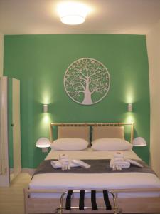 A bed or beds in a room at GELSO HOME