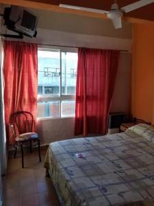 Una cama o camas en una habitación de Costa del Sol