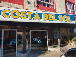 a sign for a costa del sol car dealership at Costa del Sol in San Clemente del Tuyú