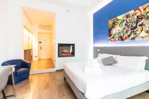Кровать или кровати в номере Sanfelice 33 Luxury Suites