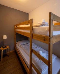 Posteľ alebo postele v izbe v ubytovaní Alex Kaprun Apartment