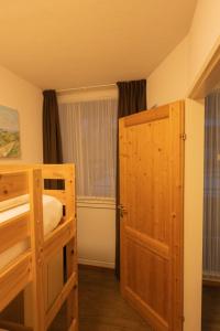 Posteľ alebo postele v izbe v ubytovaní Alex Kaprun Apartment