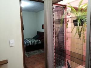 Cama o camas de una habitación en CASA ICHIK ANTIGUA GUATEMALA