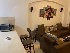 O zonă de relaxare la One-Bedroom apartment ground floor for Rent in El Gouna