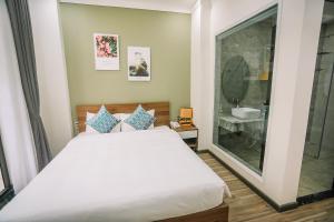 Voodi või voodid majutusasutuse Memory Inn - Green Villa toas