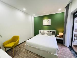 Voodi või voodid majutusasutuse Memory Inn - Green Villa toas