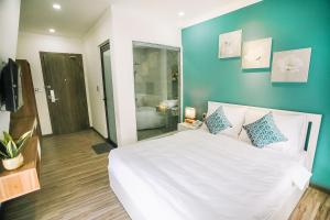 Voodi või voodid majutusasutuse Memory Inn - Green Villa toas