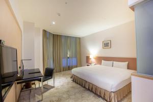 TV a/nebo společenská místnost v ubytování Taisugar Hotel Taipei