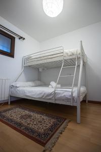 Postel nebo postele na pokoji v ubytování APARTAMENTO IRIS