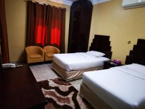 Postel nebo postele na pokoji v ubytování Address hotel Apartments العنوان للشقق الفندقية