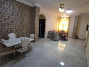 Posezení v ubytování Address hotel Apartments العنوان للشقق الفندقية