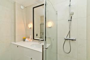 Kúpeľňa v ubytovaní BlueApart Verano Residence + 37 fotografií