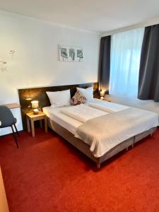 Posteľ alebo postele v izbe v ubytovaní Bed & Rooms, Wörgl