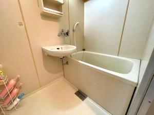 Koupelna v ubytování サービスアパ―トメントSAPPORO中島公園1LDK802