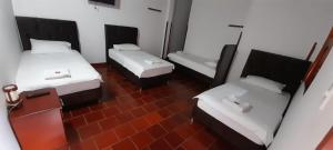 Postel nebo postele na pokoji v ubytování Posada San Luis