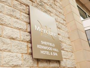 a sign for a hotel on the side of a building at Mercure Sheffield Kenwood Hall & Spa in Sheffield