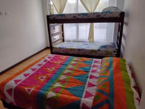 Postel nebo postele na pokoji v ubytování Apartamento Moniquira