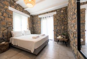 Säng eller sängar i ett rum på Avista Private Resort