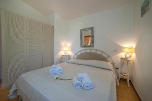 A bed or beds in a room at villa lilly